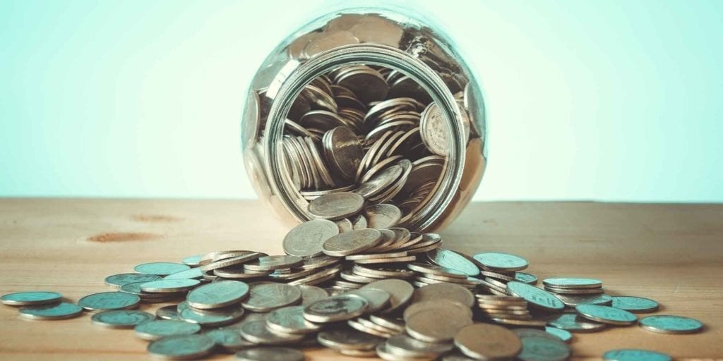 coins falling out of jar